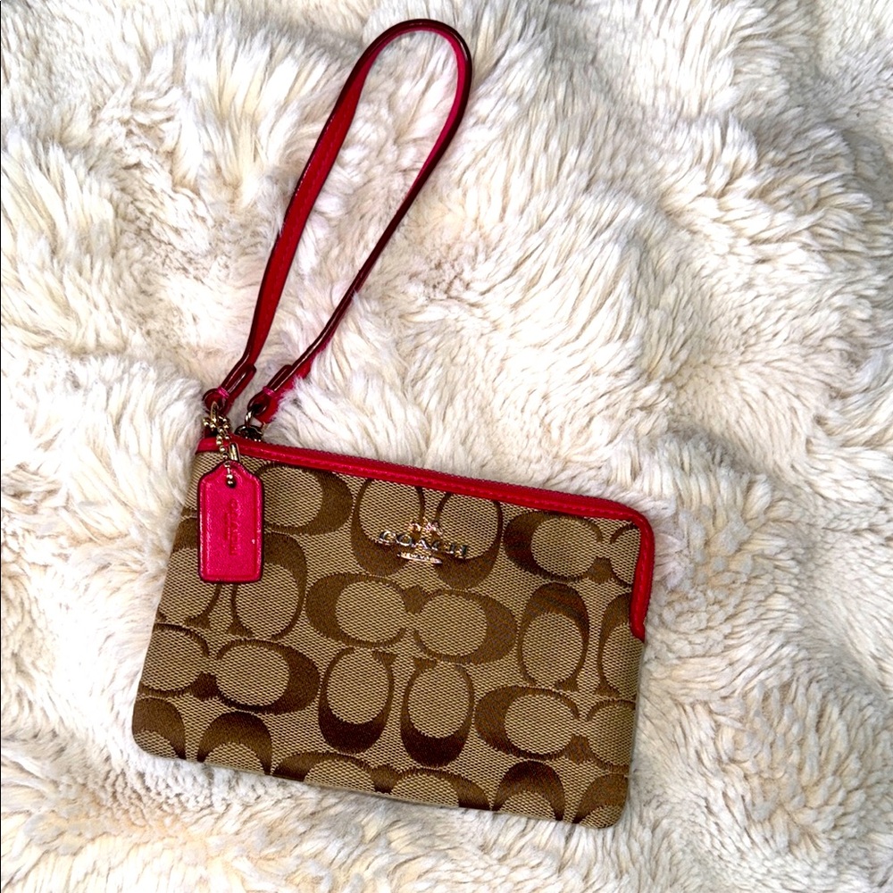 COACH WRISTLET WITH PINK TRIM